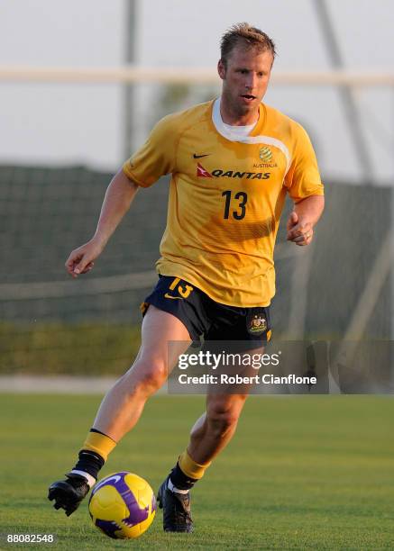 Vincenzo Grella of Australia controls the ball during an Australian Socceroos training session held at Jebel Ali International Centre of Excellence...