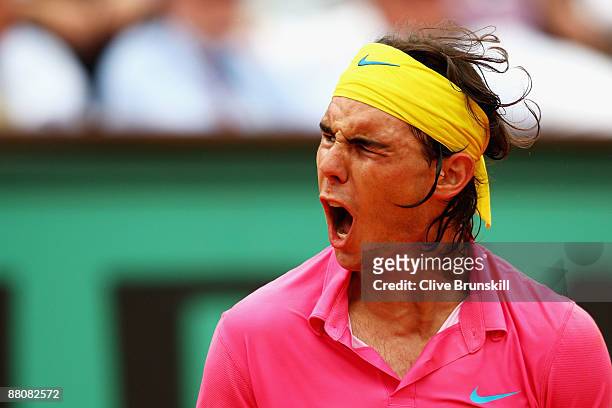 Dejected Rafael Nadal of Spain reacts as he heads towards defeat during the Men's Singles Fourth Round match against Robin Soderling of Sweden on day...