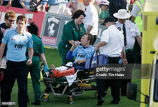 Chris Nash of Sussex is taken away by ambulance after sustaining an ankle injury in a collision with team mate Dwayne Smith during the Twenty20 Cup...