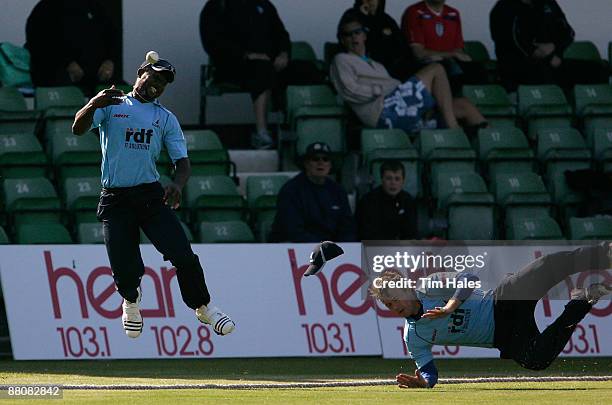 Chris Nash of Sussex collides with team mate Dwayne Smith during the Twenty20 Cup match between Kent and Sussex at St Lawrence Cricket Ground on May...