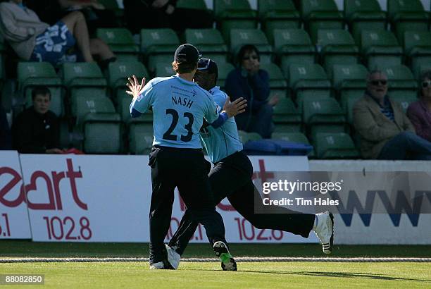 Chris Nash of Sussex sustains an ankle injury as he collides with team mate Dwayne Smith during the Twenty20 Cup match between Kent and Sussex at St...