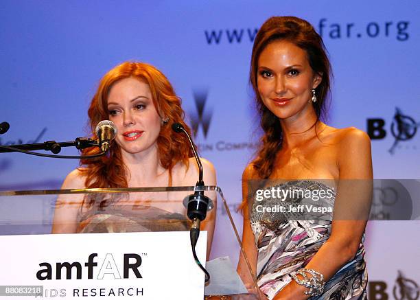 Actress Rose McGowan and actress Svetlana Metkina speak during amfAR's Cinema Against AIDS 2008 benefit held at Le Moulin de Mougins during the 61st...