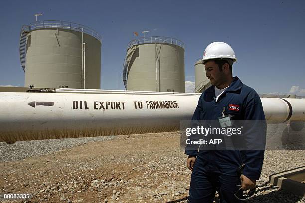 Worker is seen at the Tawke oil refinery near the village of Zacho, in the autonomous Iraqi region of Kurdistan, on May 31, 2009. Iraq's self-ruled...