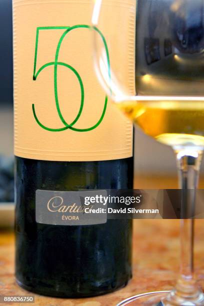 Adega da Cartuxa winery's "DOC Alentejo - Evora Branco 2012 - 50 Anos" white wine is served during a tasting at the winery on September 30, 2016 in...