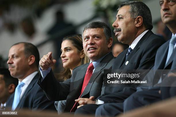King Abdullah II of Jordan , his wife Queen Rania and Prince Faisal Bin Al Hussein attend The King Abdullah Award for Fitness ceremony on May 31,...