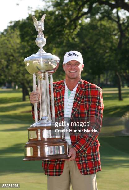 Steve Stricker holds the championship trophy after winning the Crowne Plaza Invitational at Colonial Country Club on May 31, 2009 in Ft. Worth, Texas.
