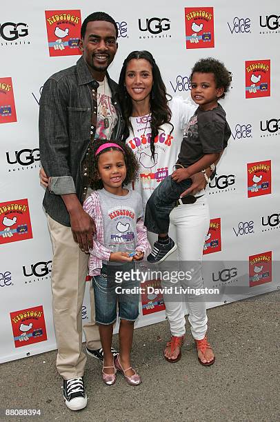 Actor Bill Bellamy , his wife Kristen Baker and their children Bailey Ivory-Rose and Baron attend the 3rd annual Kidstock Music and Art Festival at...