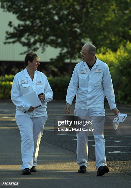 Workers return to work at the Honda factory after a four month shutdown on June 1, 2009 in Swindon, England. The re-opening of the plant, which...