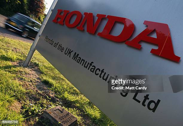 Workers return to work at the Honda factory after a four month shutdown on June 1 2009 in Swindon, England. The re-opening of the plant, which closed...