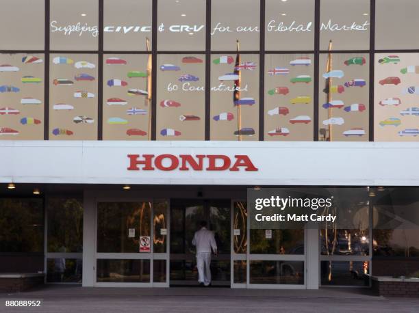 Workers return to work at the Honda factory after a four month shutdown on June 1 2009 in Swindon, England. The re-opening of the plant, which closed...