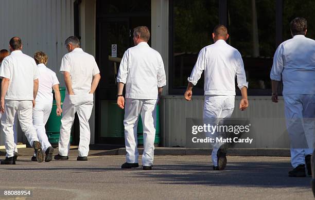 Workers return to work at the Honda factory after a four month shutdown on June 1 2009 in Swindon, England. The re-opening of the plant, which closed...