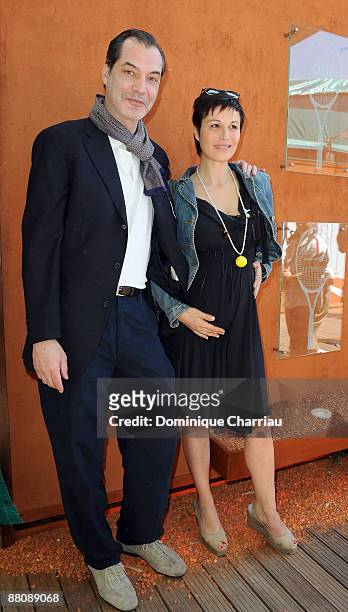 French Actress Helene Medigue and Actor Samuel Labarthe attend The French Open 2009 at Roland Garros on May 30, 2009 in Paris, France.
