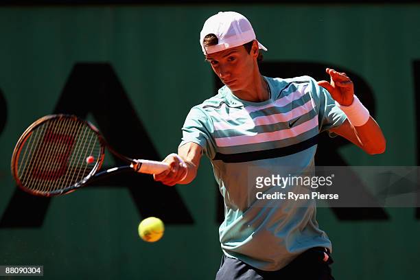 Andrey Kuznetsov of Russia hits a forehand during the Boy's Singles First Round match against Julien Obry of France on day nine of the French Open at...