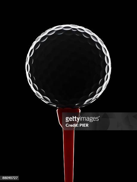 golfball on golf tee - golf tee ストックフォトと画像