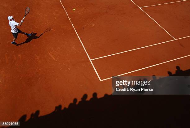 Julien Obry of France hits a forehand during the Boy's Singles First Round match against Andrey Kuznetsov of Russia on day nine of the French Open at...