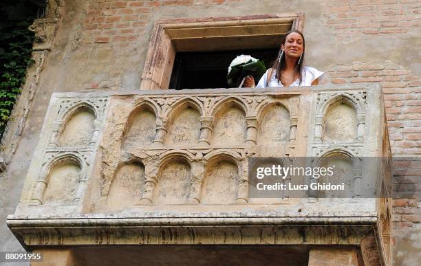 Irene Lanforti poses on Romeo and Juliet balcony for her wedding with Hellas Verona football player Luca Ceccarelli on June 1, 2009 in Verona, Italy....