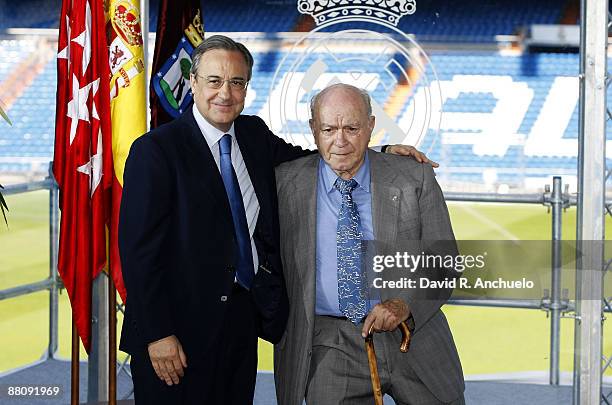 Florentino Perez greets Alfredo Di Stefano during his presentation as new president of Real Madrid at the Presidential Balcony of the Santiago...