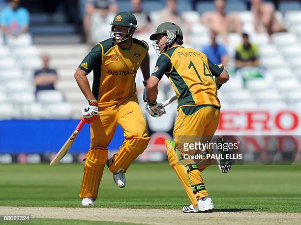 Australian cricketers Andrew Symonds and Ricky Ponting run between the wickets against Bangladesh during a warm up match at Trent Bridge in...