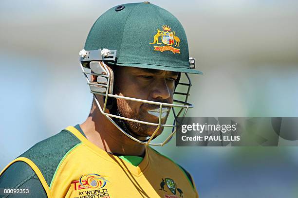 Australian cricketer Andrew Symonds returns to the pavillion after being dismissed against Bangladesh during a warm up match at Trent Bridge in...