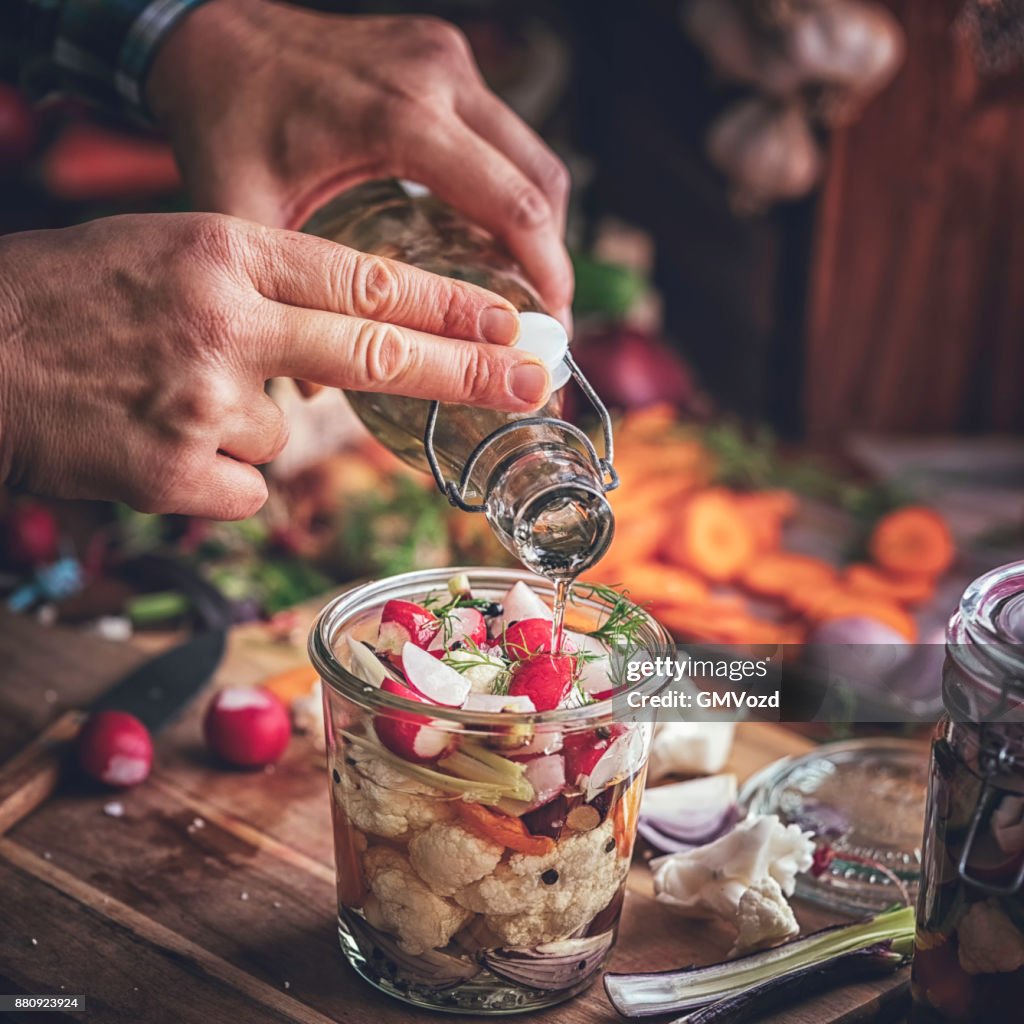 Preserving Organic Cauliflower, Carrots, Onion and Radishes in Jars