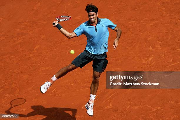 Roger Federer of Switzerland celebrates victory during the Men's Singles Fourth Round match against Tommy Haas of Germany on day nine of the French...