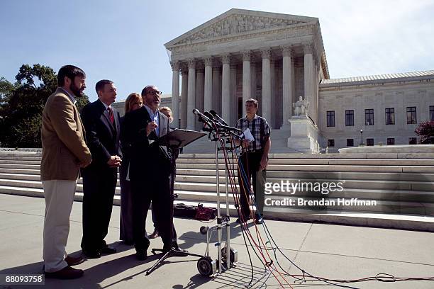 Rev. Patrick Mahoney of the Christian Defense Coalition, with other abortion opponents, speaks at a news conference outside the U.S. Supreme Court to...