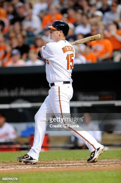 Matt Wieters of the Baltimore Orioles hits a triple for his first major league hit during the game against the Detroit Tigers at Camden Yards on May...