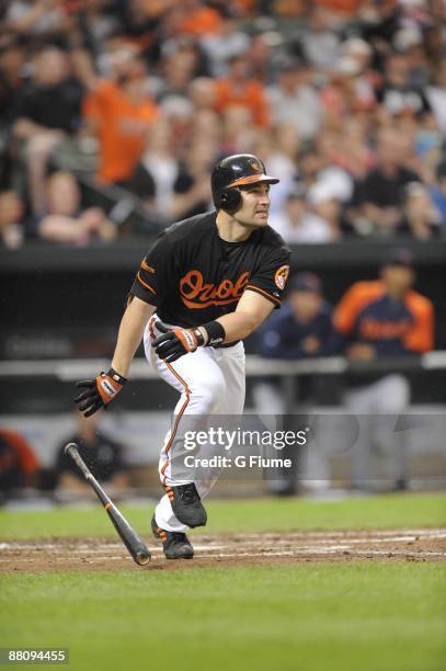 Luke Scott of the Baltimore Orioles hits a home run in the third inning against the Detroit Tigers at Camden Yards on May 29, 2009 in Baltimore,...