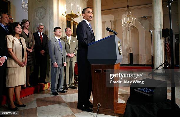 President Barack Obama speaks about the Chapter 11 bankruptcy filing by General Motors as Director of the National Economic Council Larry Summers,...