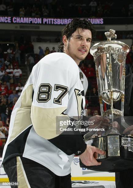 Sidney Crosby of the Pittsburgh Penguins poses with the Prince of Wales trophy after Game Four of the Eastern Conference Championship Round of the...