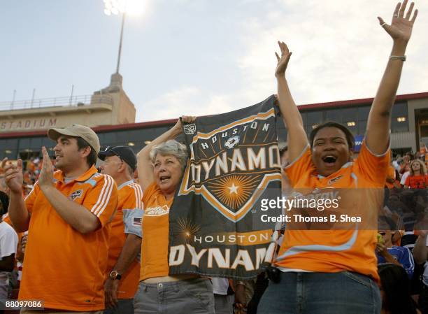 Houston Dynamo fans celebrate Brad Davis of the Houston Dynamo goal against Toronto FC at Robertson Stadium on May 30, 2009 in Houston, Texas. The...
