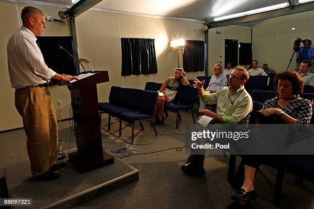 Michael Berrigan, the deputy chief defense counsel for the Guantanamo tribunals, listens to a question during a news conference after a U.S....