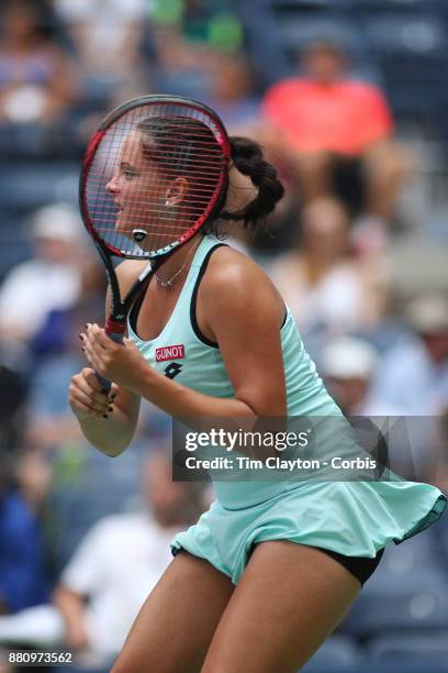 Open Viktoria Kuzmova of Slovakia in action against Venus Williams of the United States on Arthur Ashe Stadium during the Women's Singles round one...