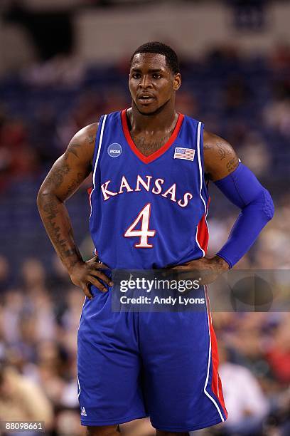 Sherron Collins of the Kansas Jayhawks looks on against the Michigan State Spartans during the third round of the NCAA Division I Men's Basketball...