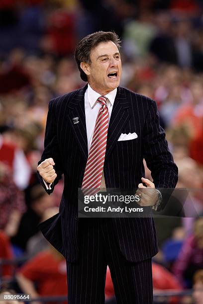 Head coach Rick Pitino of the Louisville Cardinals coaches against the Arizona Wildcats during the third round of the NCAA Division I Men's...