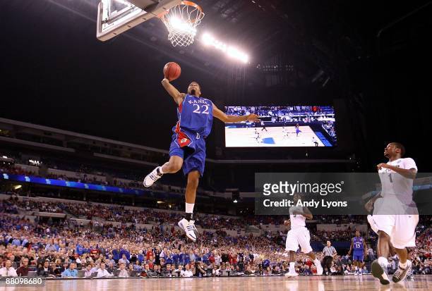 Marcus Morris of the Kansas Jayhawks drives for a dunk attempt against the Michigan State Spartans during the third round of the NCAA Division I...