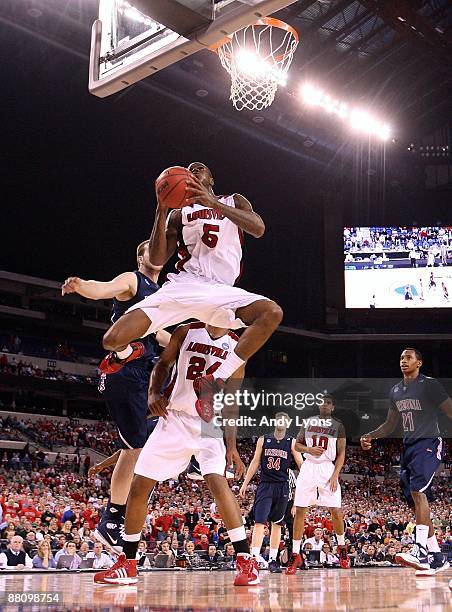 Earl Clark of the Louisville Cardinals drives for a shot attempt against the Arizona Wildcats during the third round of the NCAA Division I Men's...