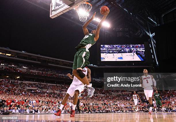 Delvon Roe of the Michigan State Spartans drives for a shot attempt against the Louisville Cardinals during the fourth round of the NCAA Division I...