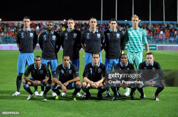 England line up for a group photo before the UEFA Euro 2012 Qualifier between Montenegro and England at the City Stadium on October 07, 2011 in...