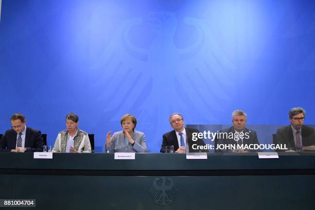 Berlin's mayor Michael Mueller, German Environment Minister Barbara Hendricks, German Chancellor Angela Merkel, Saxony-Anhalt's State Premier Reiner...