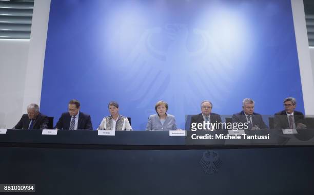 German Environment Minister Barbara Hendricks and German Chancellor and Chairwoman of the Christ Democrats Party Angela Merkel sits during the summit...