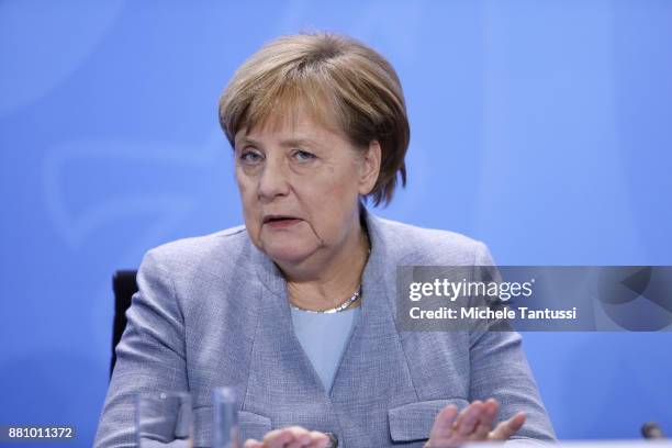 German Chancellor and Chairwoman of the Christ Democrats Party Angela Merkel adress the media during a press conference following the summit on...