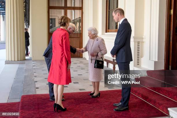 Queen Elizabeth II and Prince William, Duke of Cambridge greet the President of Germany Frank-Walter Steinmeier and his wife Elke Budenbender outside...