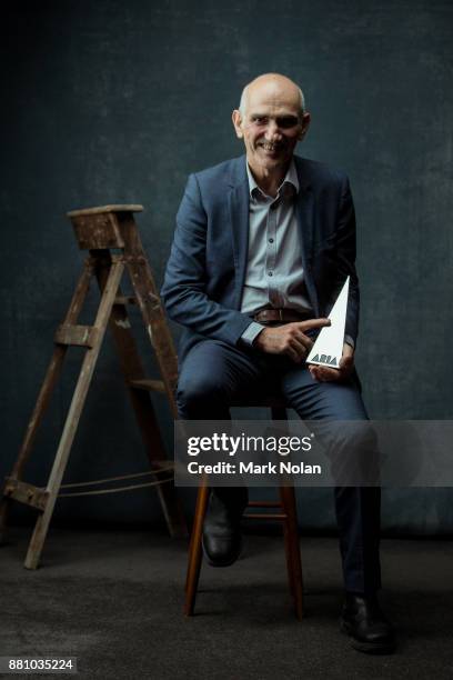 Paul Kelly poses for a portrait with an ARIA for Best Male Artist during the 31st Annual ARIA Awards 2017 at The Star on November 28, 2017 in Sydney,...