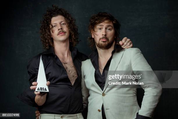 Adam Hyde and Reuben Styles of Peking Duk pose for a portrait with an ARIA for Apple Music Song of The Year during the 31st Annual ARIA Awards 2017...