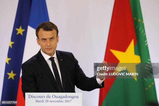 French President Emmanuel Macron speaks at the Ouagadougou University, in Ouagadougou, on November 28 as part of his first African tour since taking...