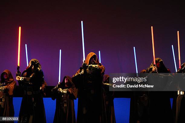 Characters wielding lightsabers take to the stage to promote Star Wars The Old Republic at the Entertainment Software Association press conference...