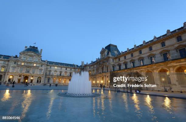 The Louvre Pyramid in Paris. The Louvre Pyramid is a large glass and metal pyramid designed by the architect I. M. Pei, surrounded by three smaller...