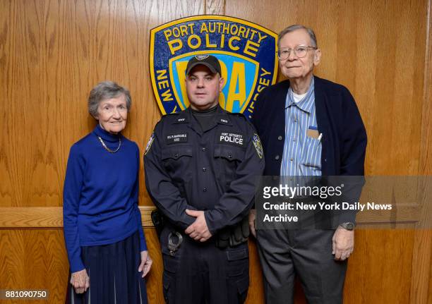 Constance Hayes Port Authority Police Officer Mike Barnable and Edward Lewinson pose for photos inside Port Authority Police Department union...