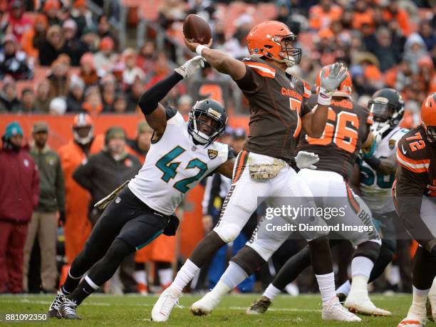 Safety Barry Church of the Jacksonville Jaguars pressures quarterback DeShone Kizer of the Cleveland Browns in the first quarter of a game on...